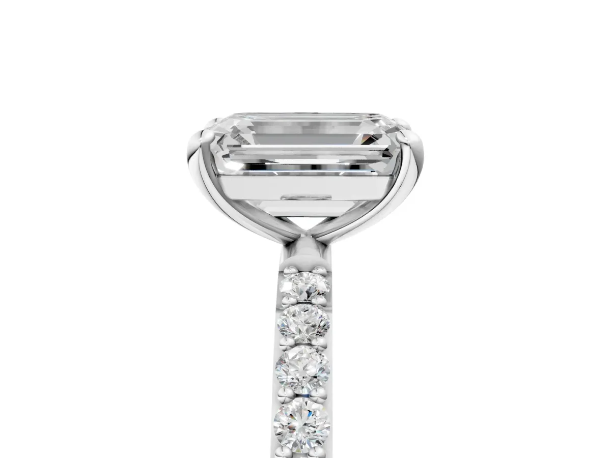 Emerald Cut Diamond Solitaire Ring with Round Moissanite Pavé Band and Prong Setting Silver