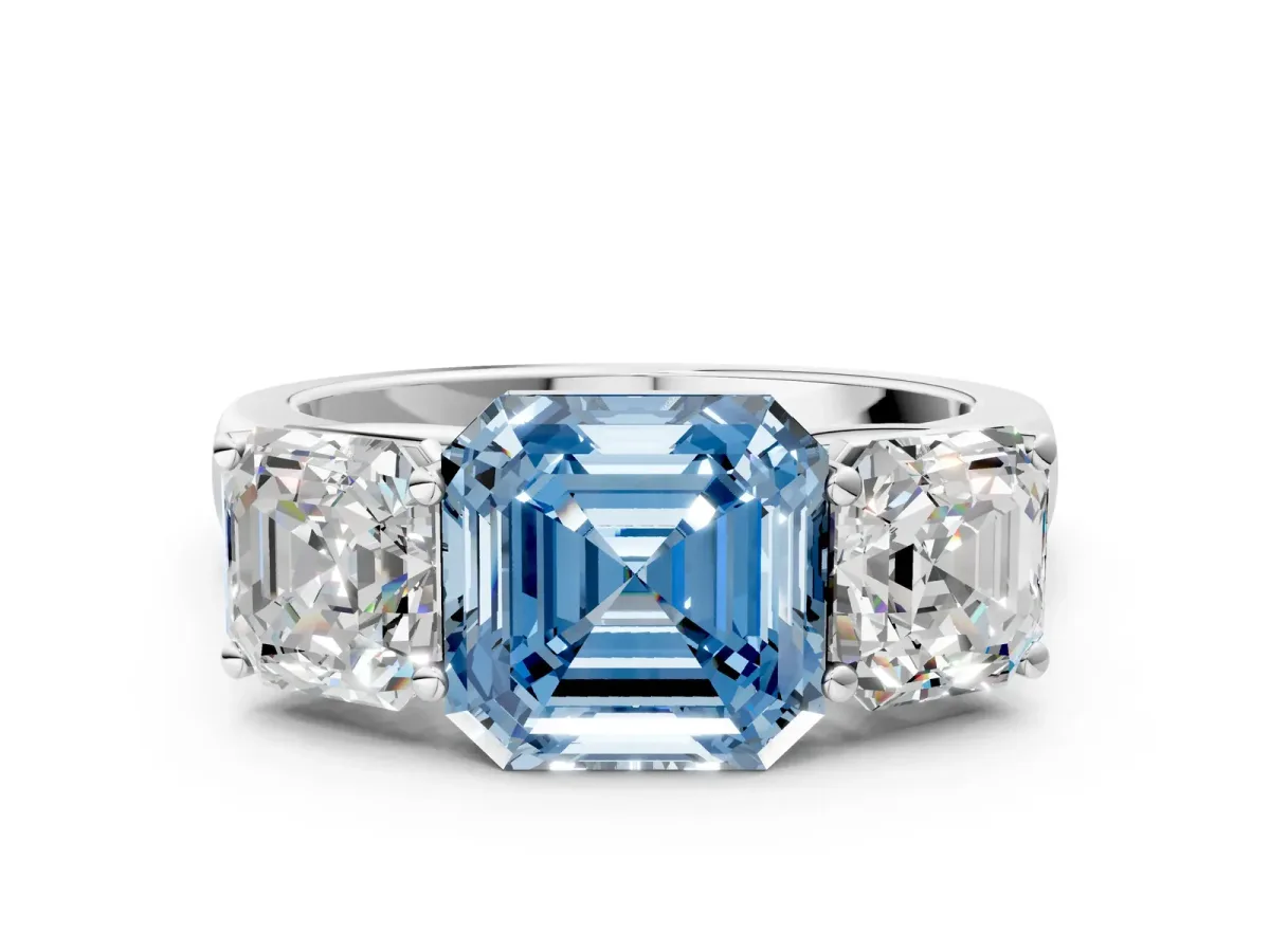 Fancy Blue Asscher Cut Three-Stone Diamond Ring with Prong Setting on a Classic Band Platinum