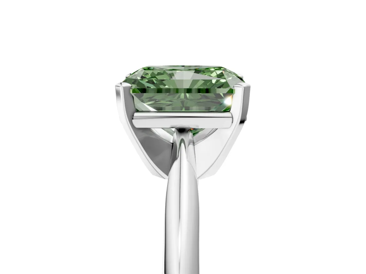 Fancy Green Radiant Cut Cut Solitaire Ring with Four-Prong Setting on a Classic Band Platinum