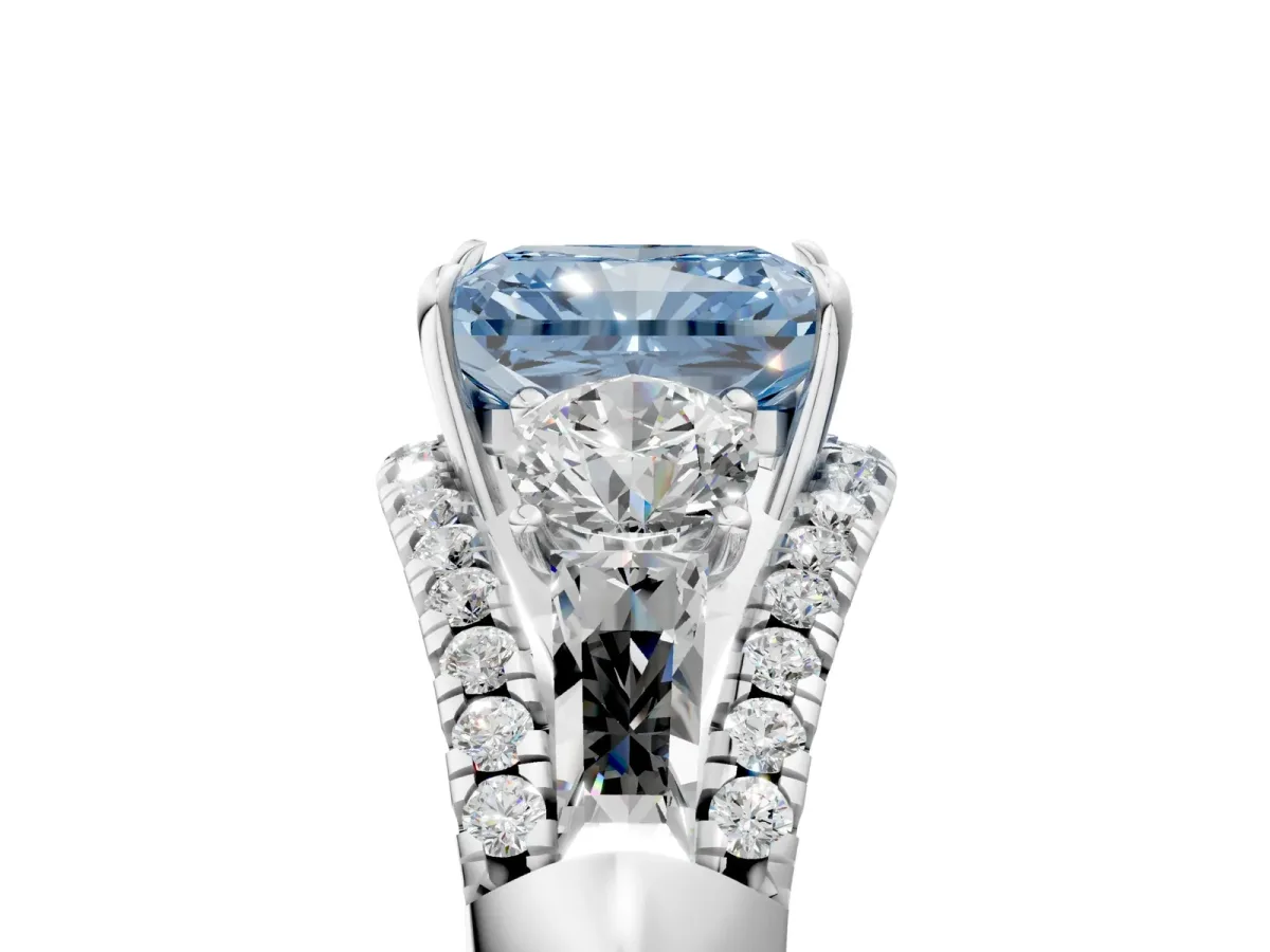 Fancy Blue Three-Stone Radiant Cut Diamond Engagement Ring with Pave Band and Prong Setting Platinum