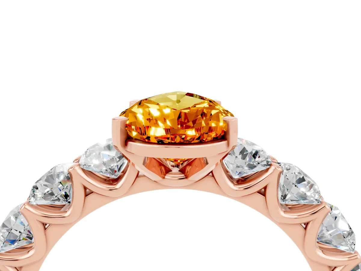 Pear Cut Citrine Prong Setting with Side Stones on a Pave Band Rose gold