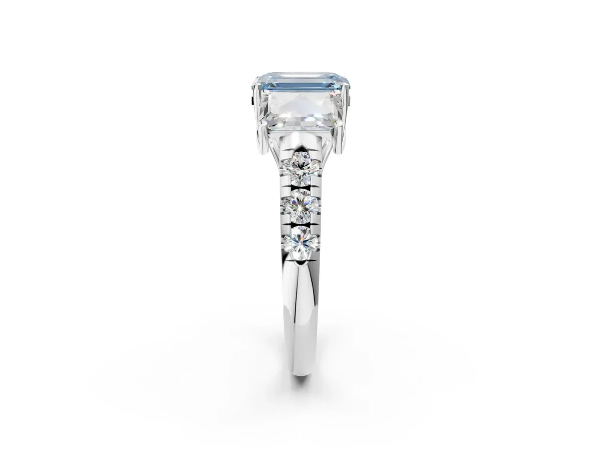 Fancy Blue Three-Stone Emerald Cut Diamond Pavé Band with Prong Setting Platinum