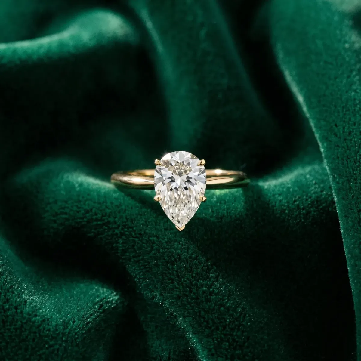 Pear Cut Diamond Solitaire Ring with Six-Prong Setting and Classic Band Yellow gold