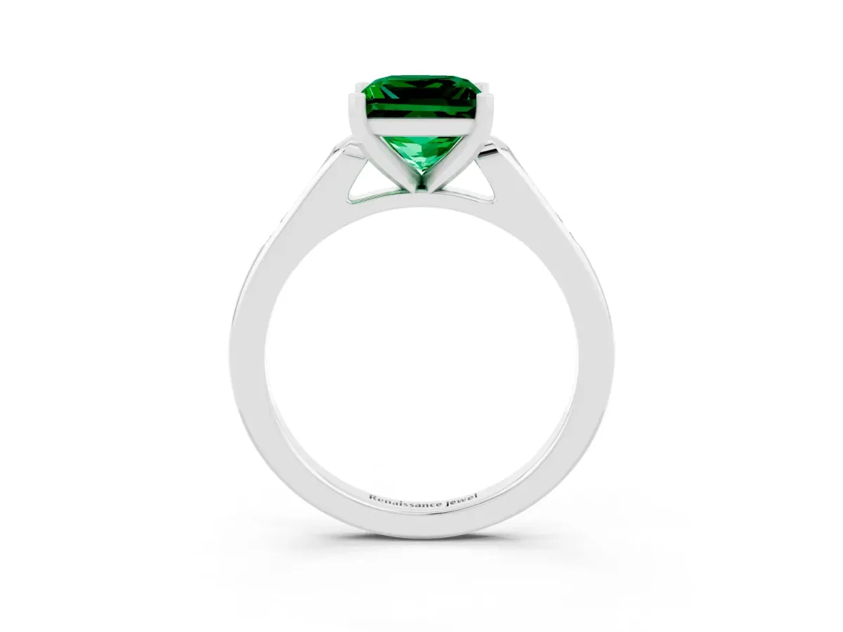 Princess Cut Emerald Solitaire Ring with Channel Set Round Band and Prong Setting Silver