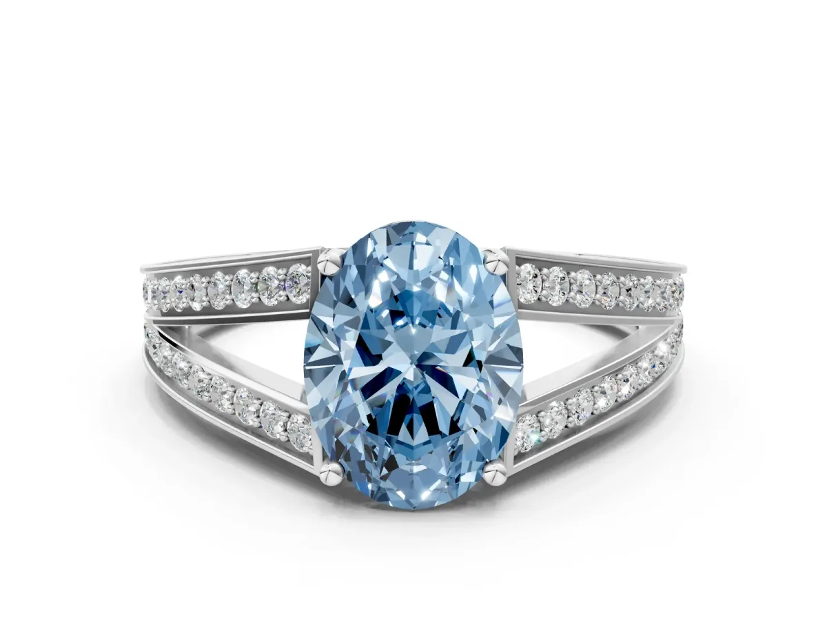 Fancy Blue Oval Cut Diamond Split Shank Ring with Pavé Band and Four-Prong Setting White gold