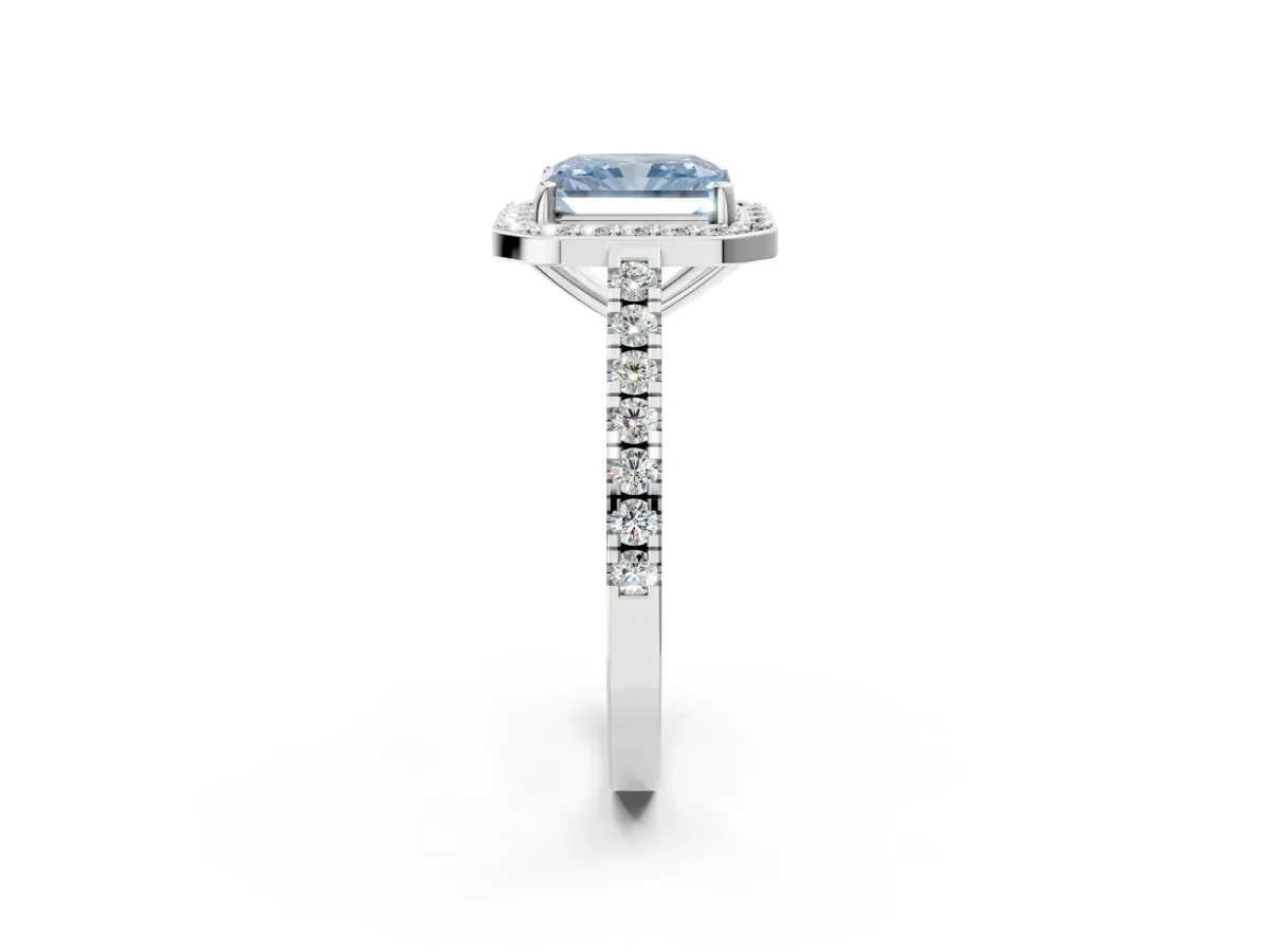 Fancy Blue Radiant Cut Diamond Halo Ring with Round Pavé Split Shank and Prong Setting Platinum