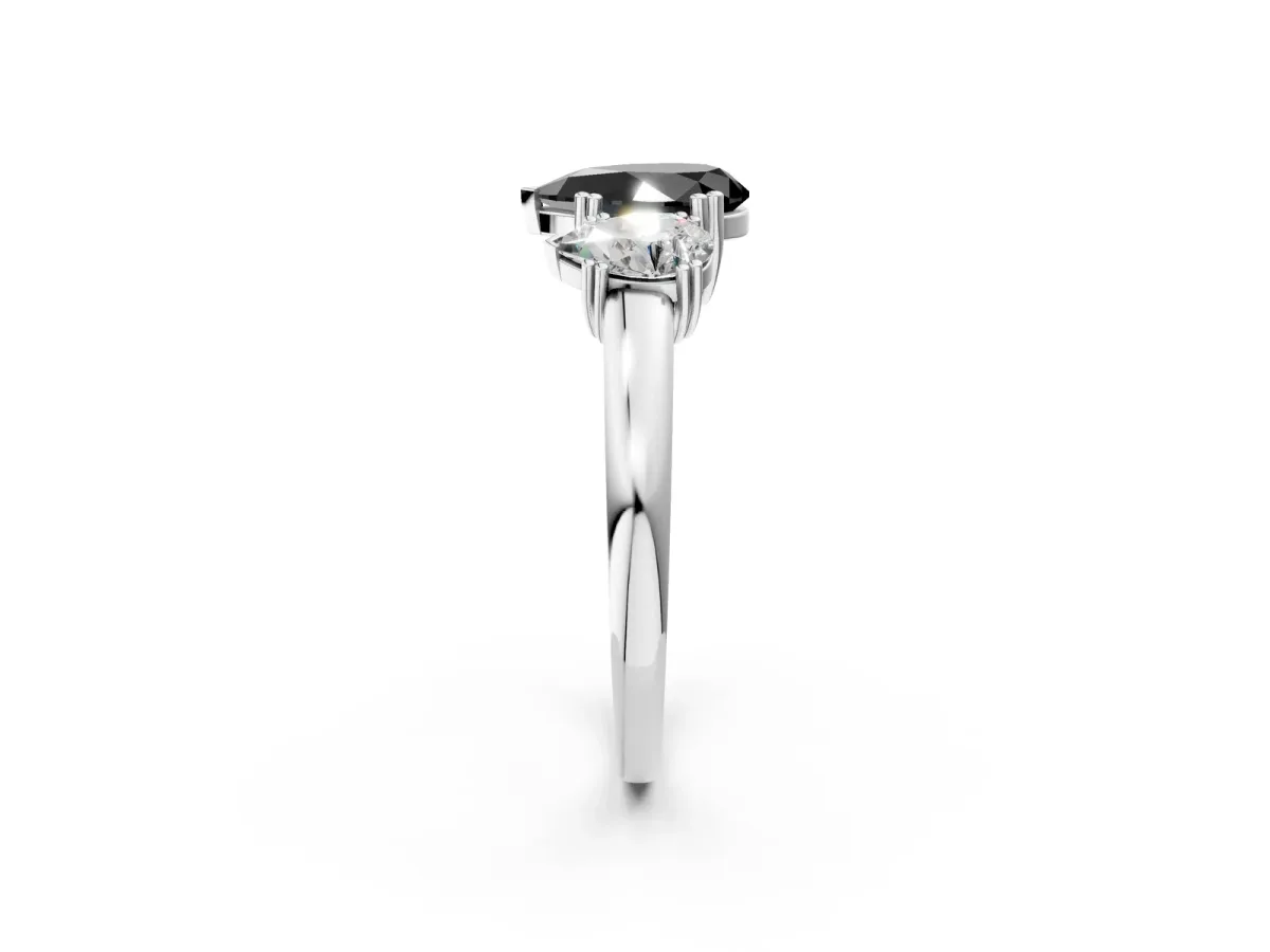 Fancy Black Three-Stone Pear Cut Cut Diamond Ring with Channel Set Band and Four-Prong Setting Platinum