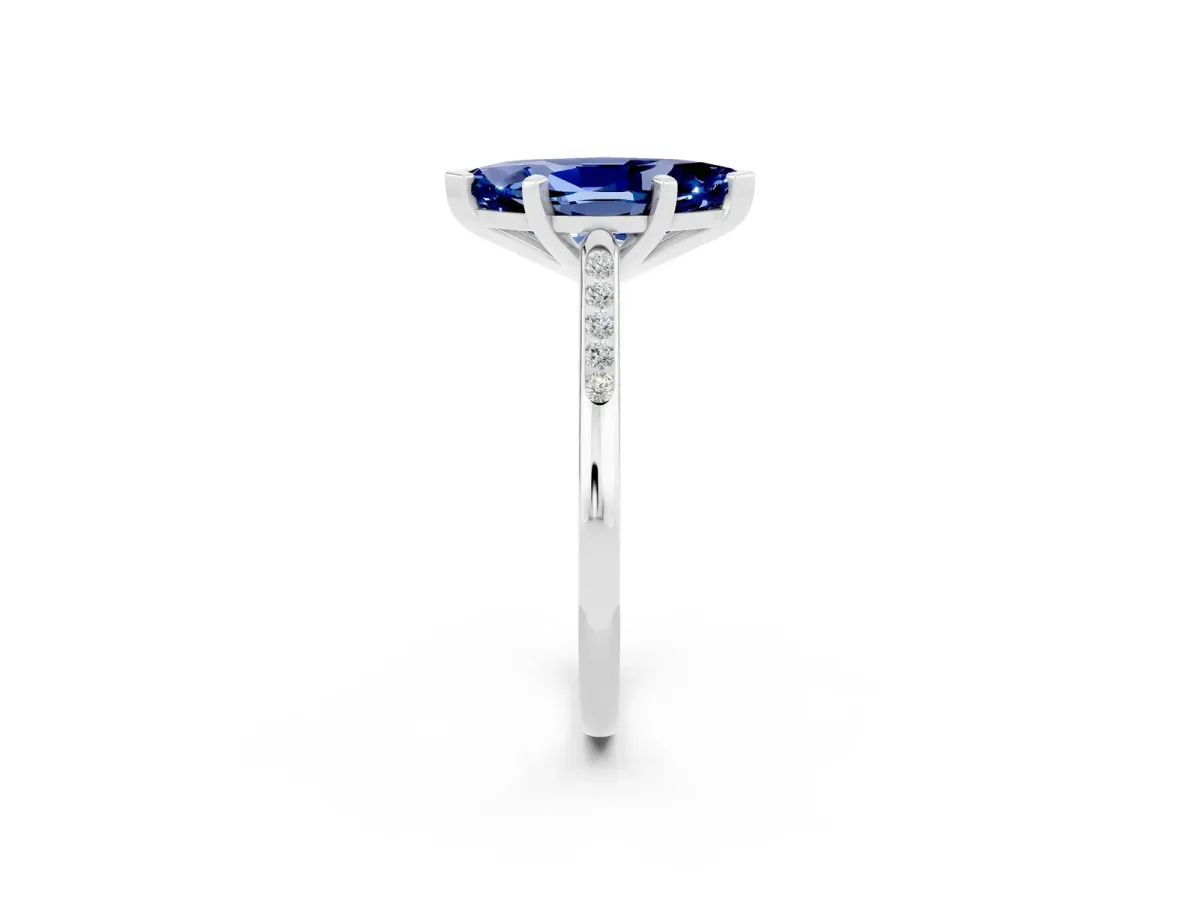 Marquise Cut Blue Sapphire Solitaire Ring with Channel Set Round Band and Prong Setting Silver