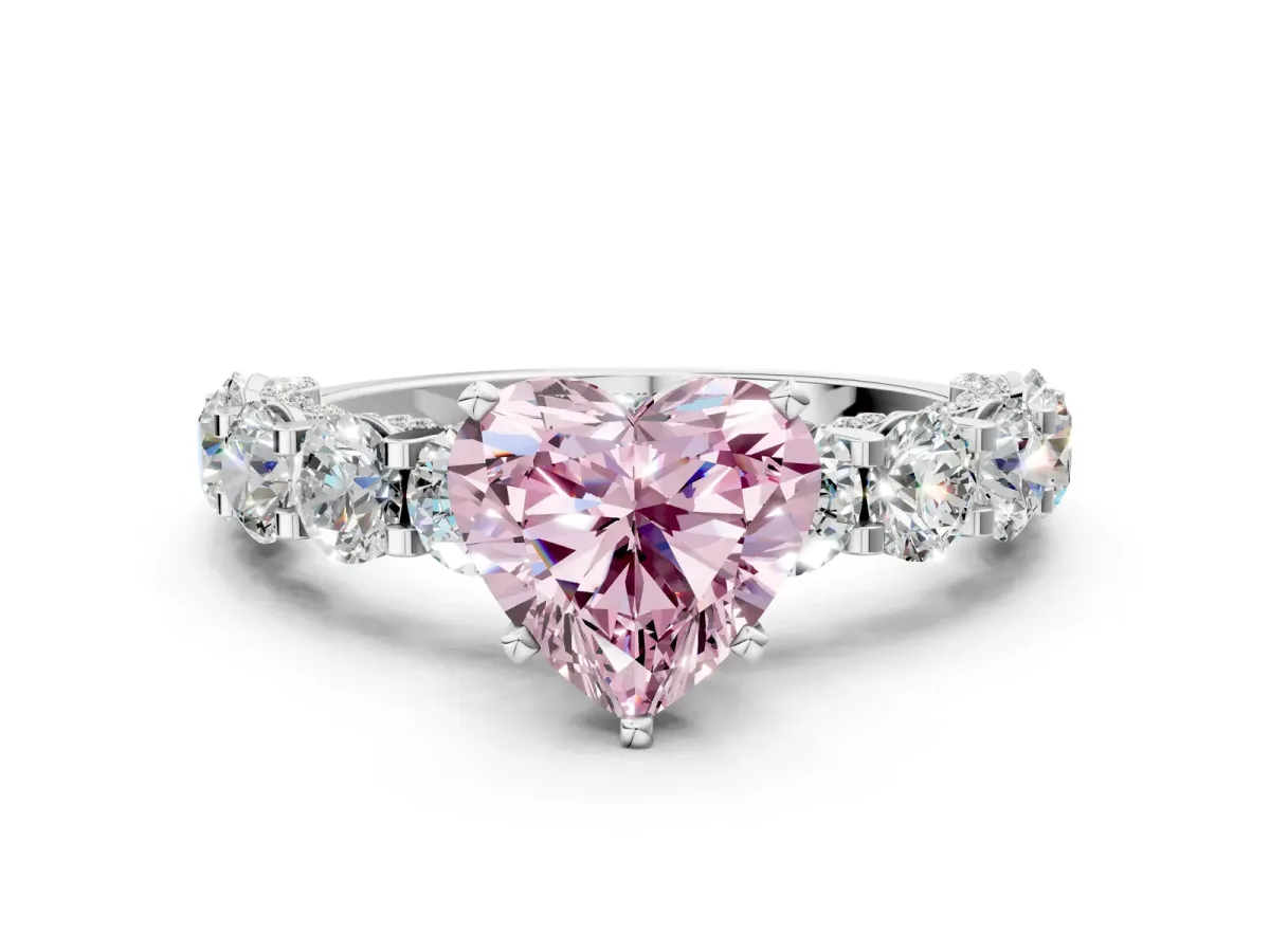 Fancy Pink Heart Cut Diamond Side Stone Engagement Ring with Four-Prong Setting White gold