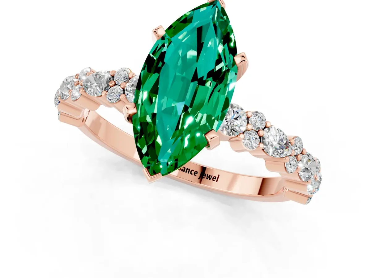 Marquise Cut Emerald Side Stone Solitaire Ring with Round and Four-Prong Setting Rose gold