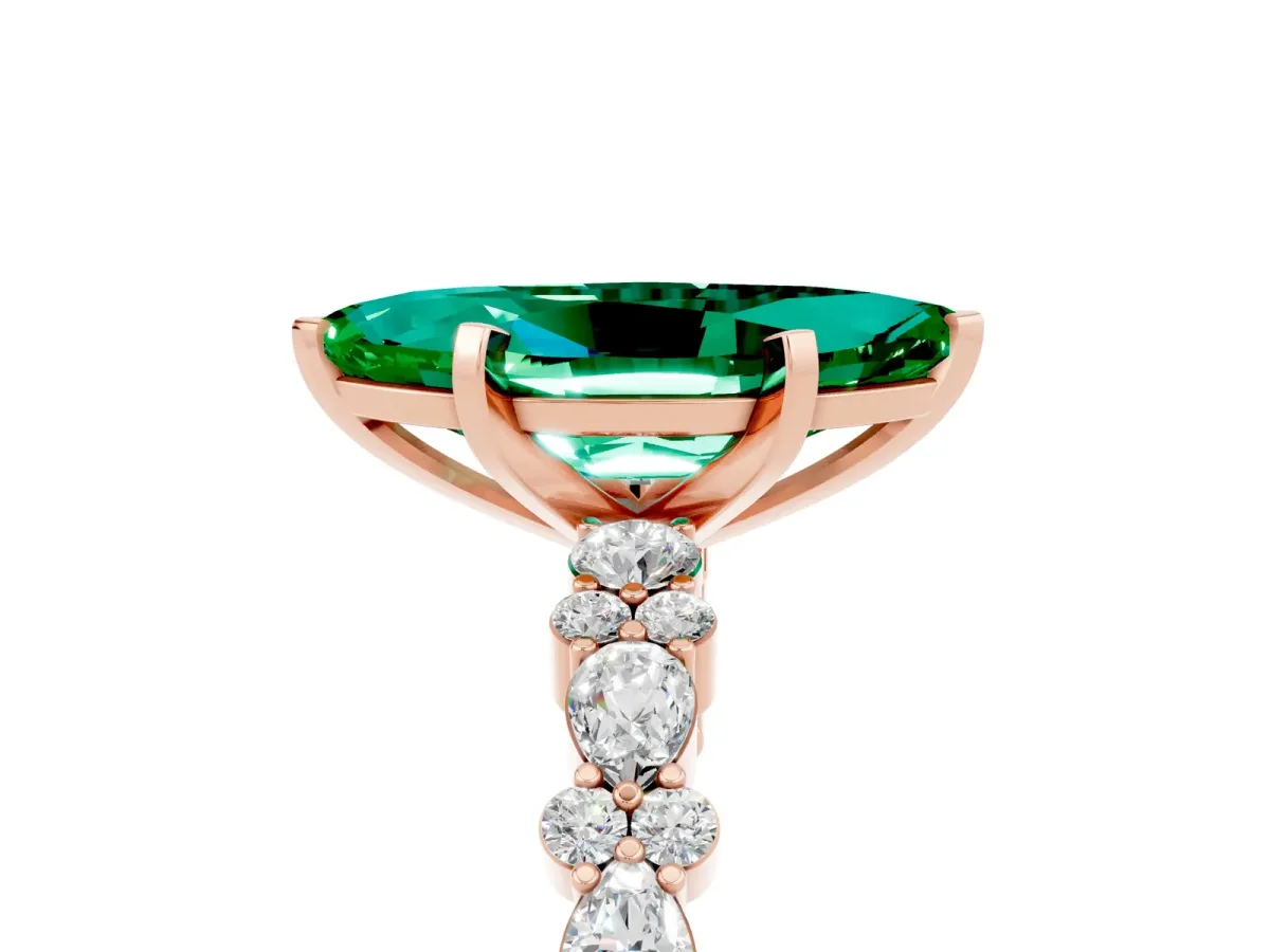 Marquise Cut Emerald Side Stone Solitaire Ring with Round and Four-Prong Setting Rose gold