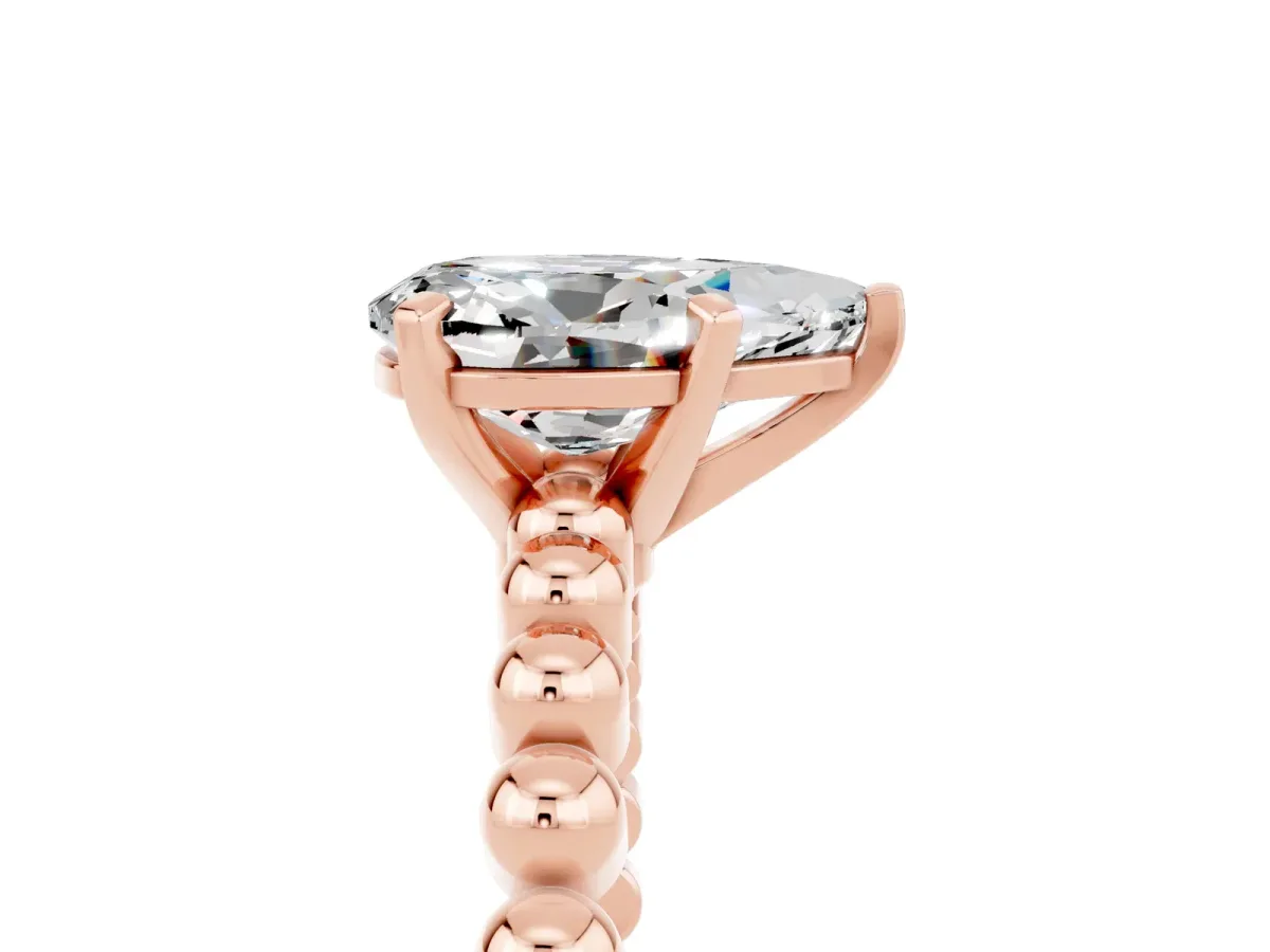 Pear Cut Moissanite Solitaire Ring with Beaded Band and Prong Setting Rose gold