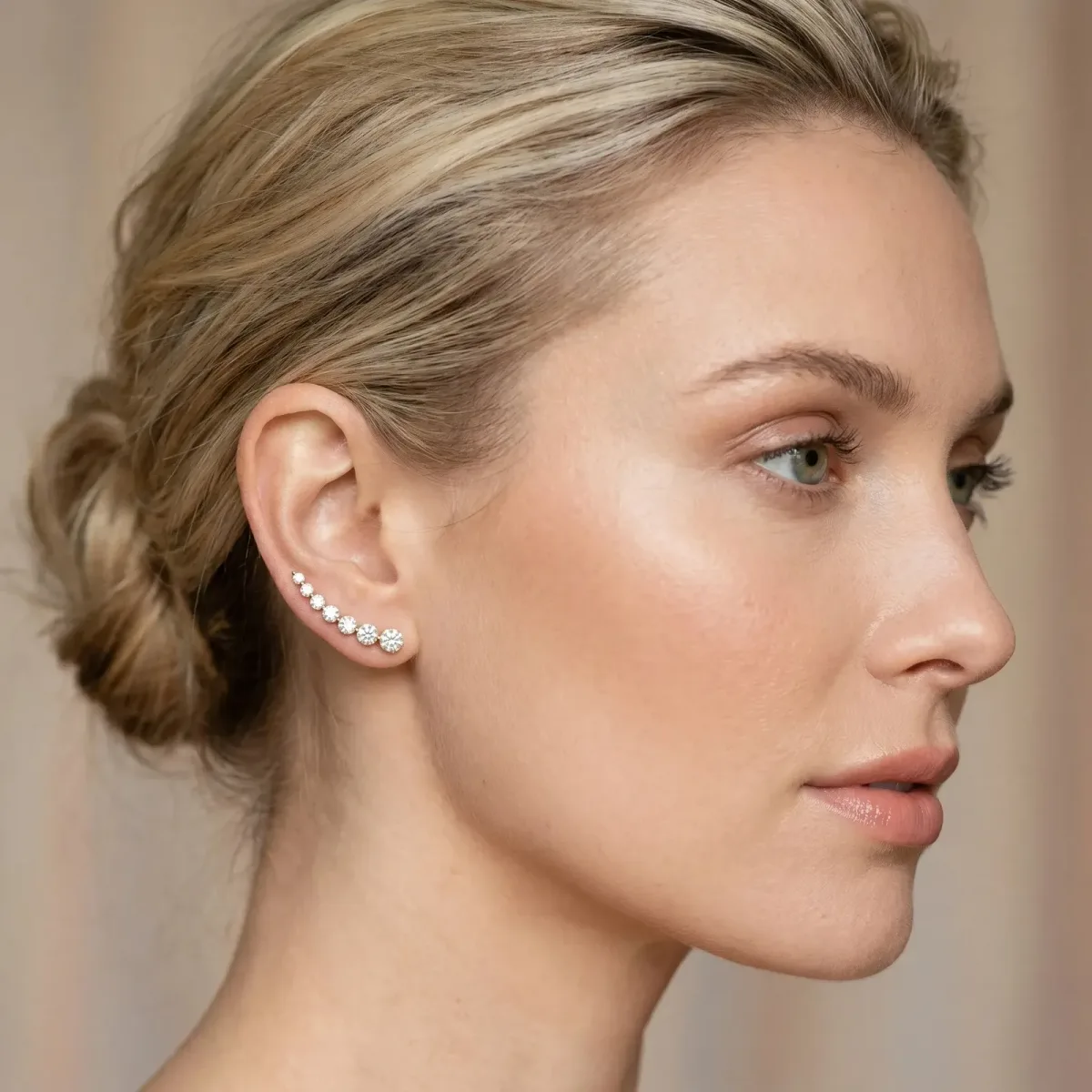 Round Diamond Climber Earrings with Prong Setting on Curved Band Yellow gold
