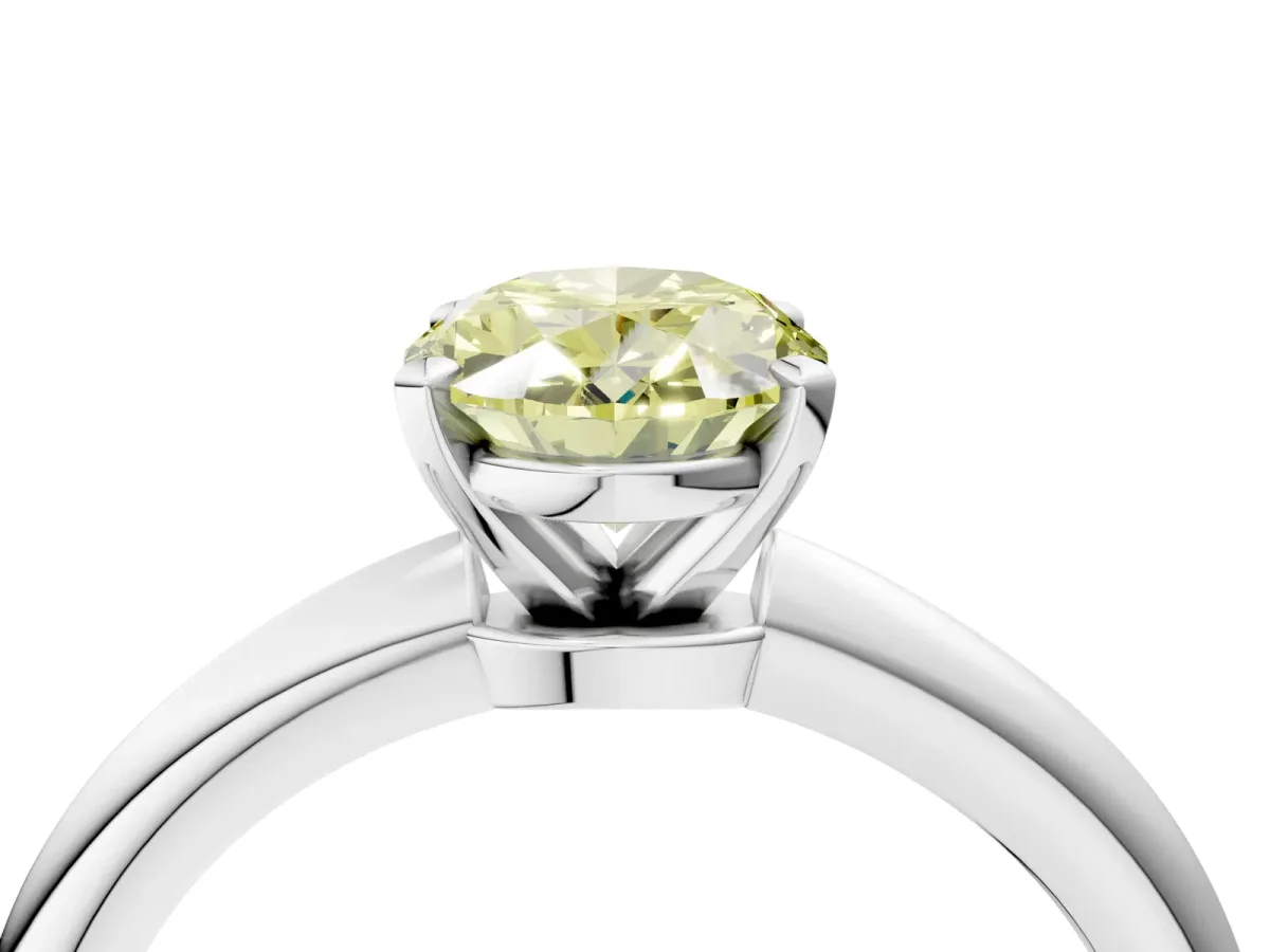 Fancy Yellow Oval Cut Diamond Solitaire Ring with Six-Prong Setting and Classic Band Platinum