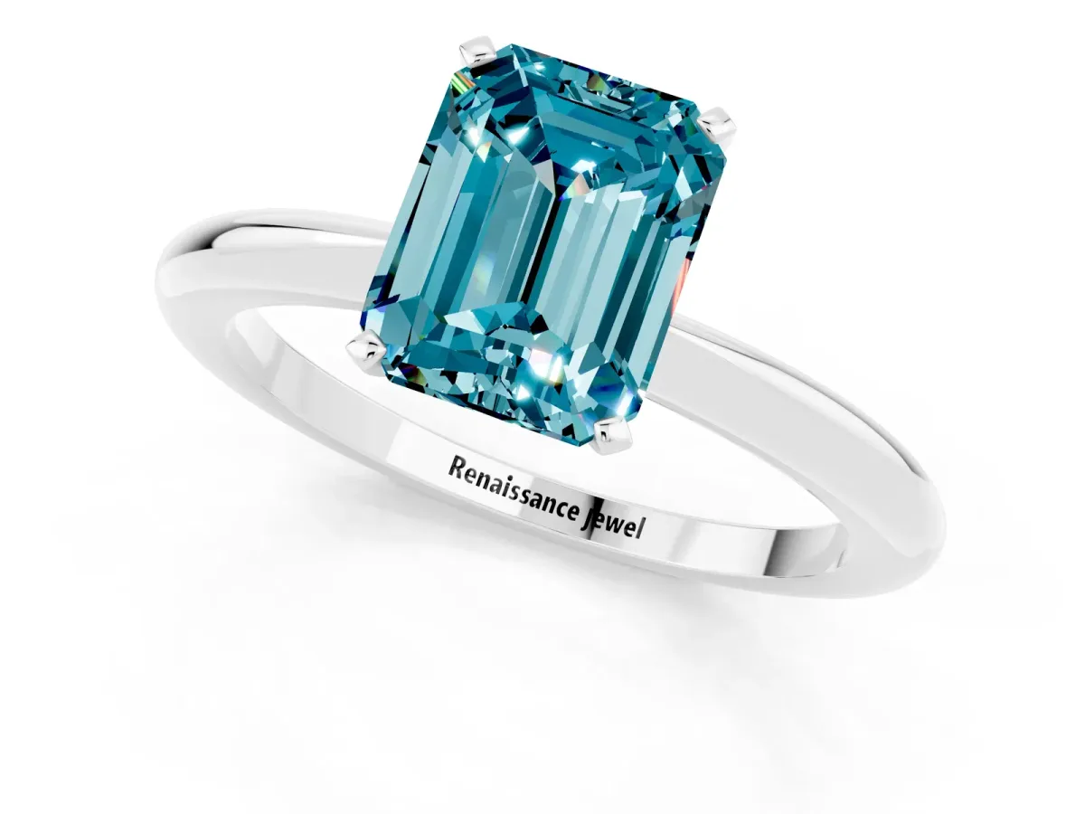 Emerald Cut Blue Topaz Solitaire Ring with Six-Prong Setting and Classic Band Silver