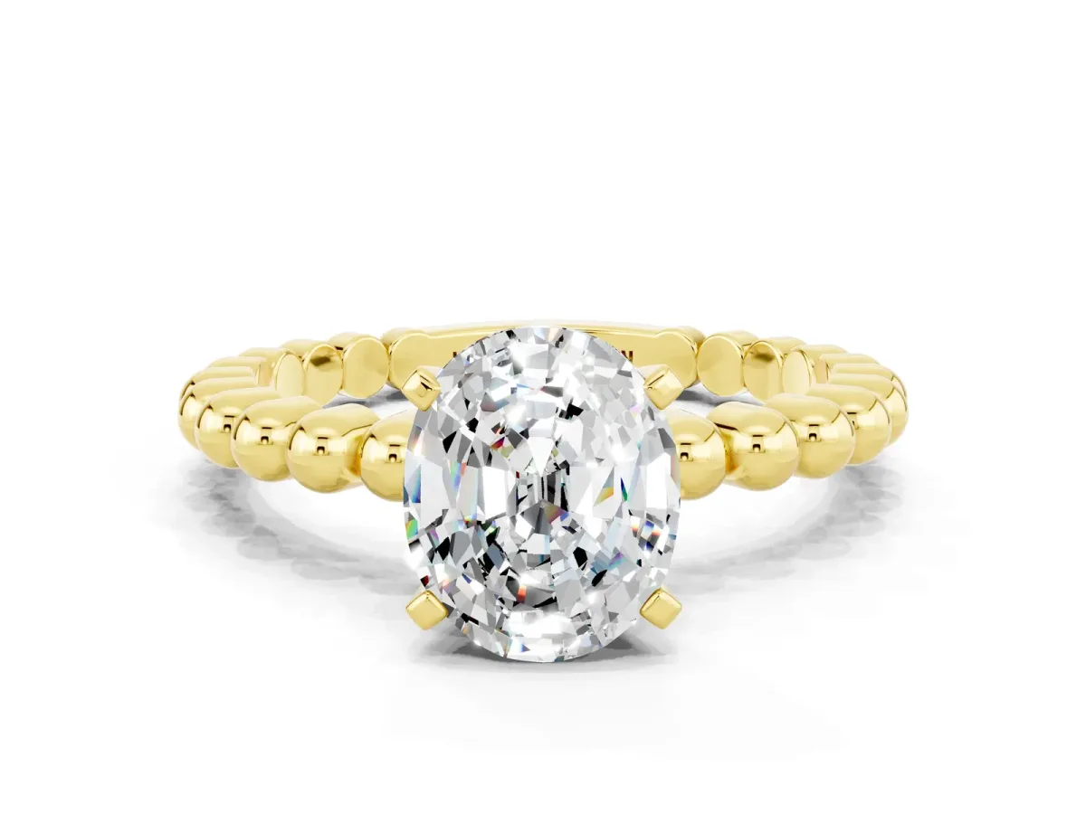Oval Cut Moissanite Solitaire Ring with Beaded Band and Prong Setting Yellow gold