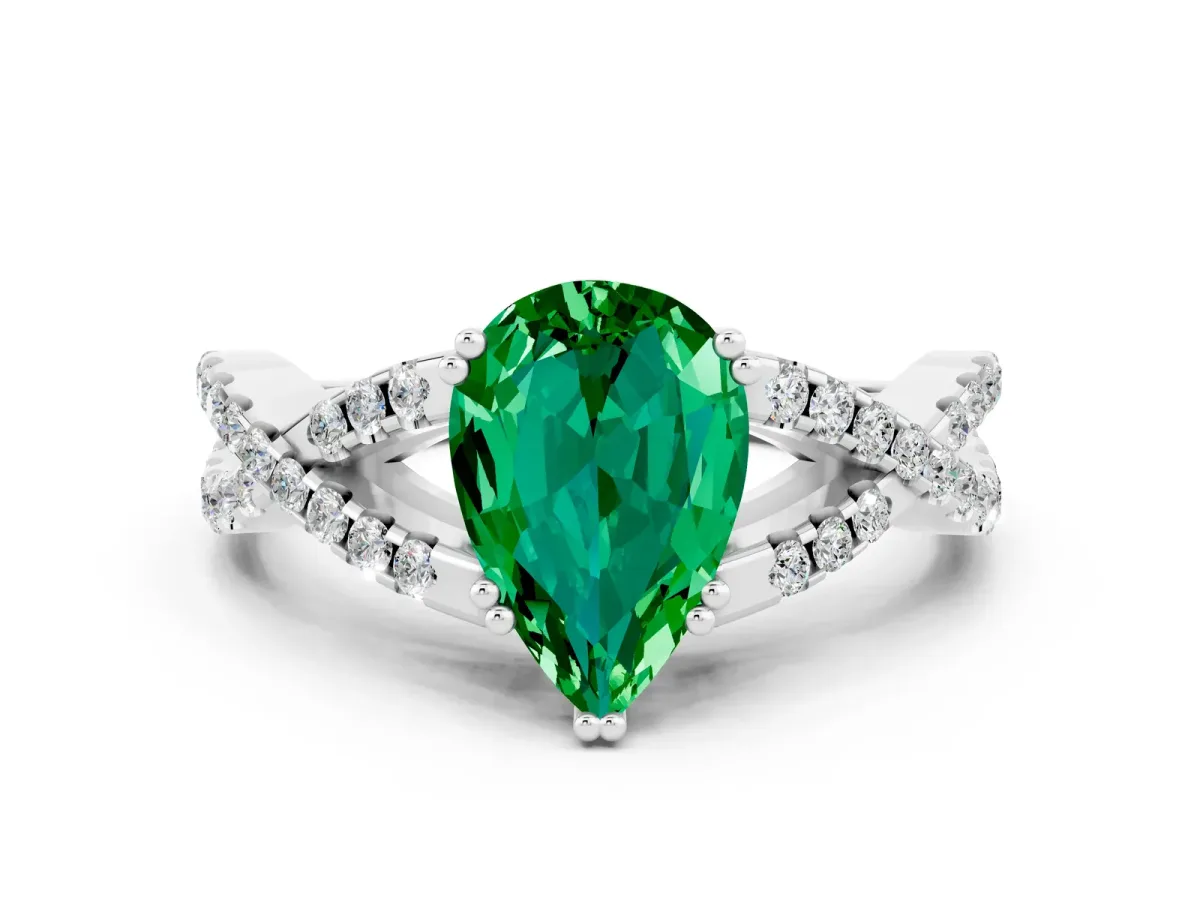 Pear Cut Emerald Solitaire Ring with Four-Prong Setting and Twisted Pavé Band Platinum