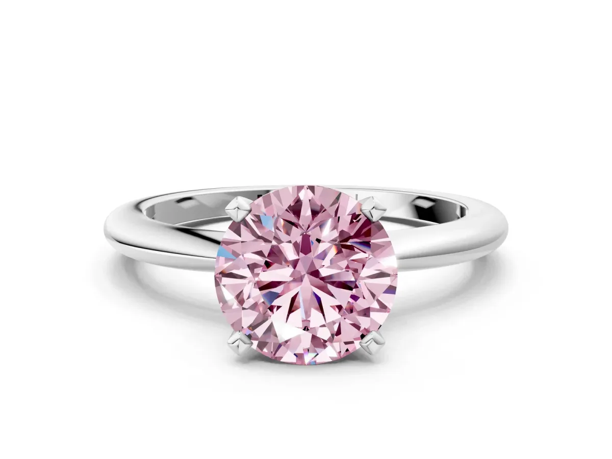 Fancy Pink Round Cut Diamond Solitaire Ring with Six-Prong Setting and Classic Band Silver