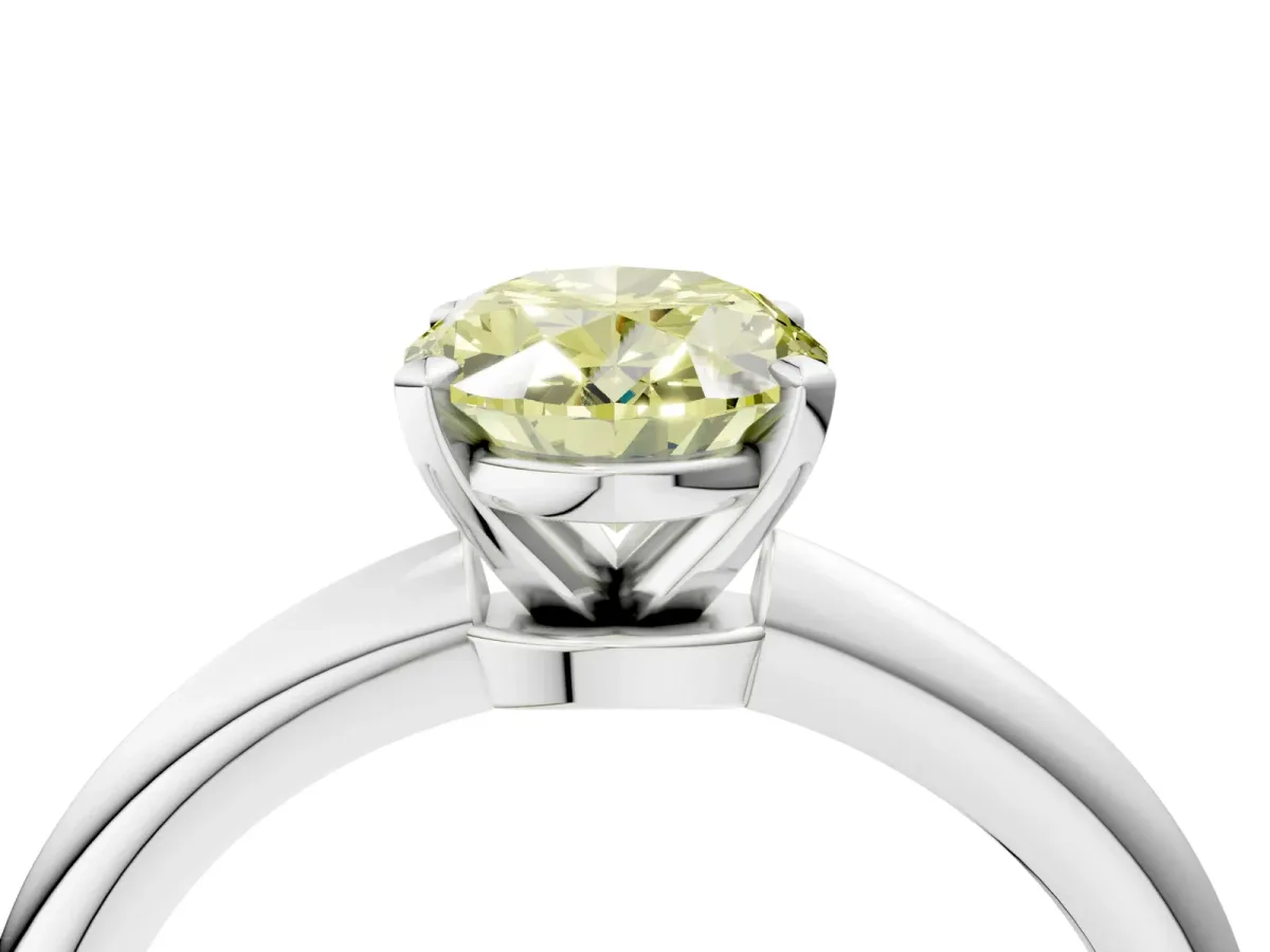 Fancy Yellow Oval Cut Diamond Solitaire Ring with Six-Prong Setting and Classic Band Platinum