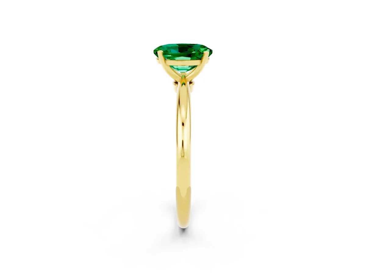 Oval Cut Emerald Solitaire Ring with Six-Prong Setting and Classic Band Yellow gold