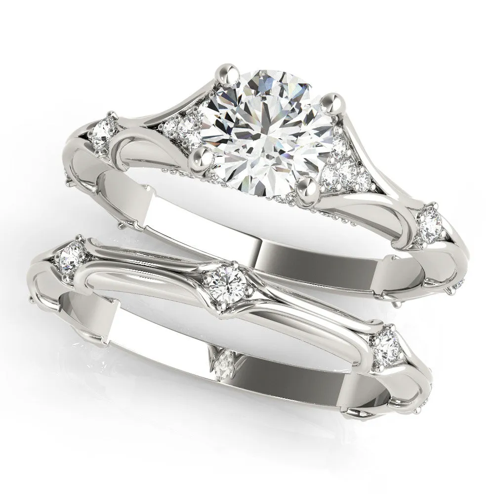 Round Cut Cut Solitaire Engagement Ring with Pave Band and Four-Prong Setting Silver