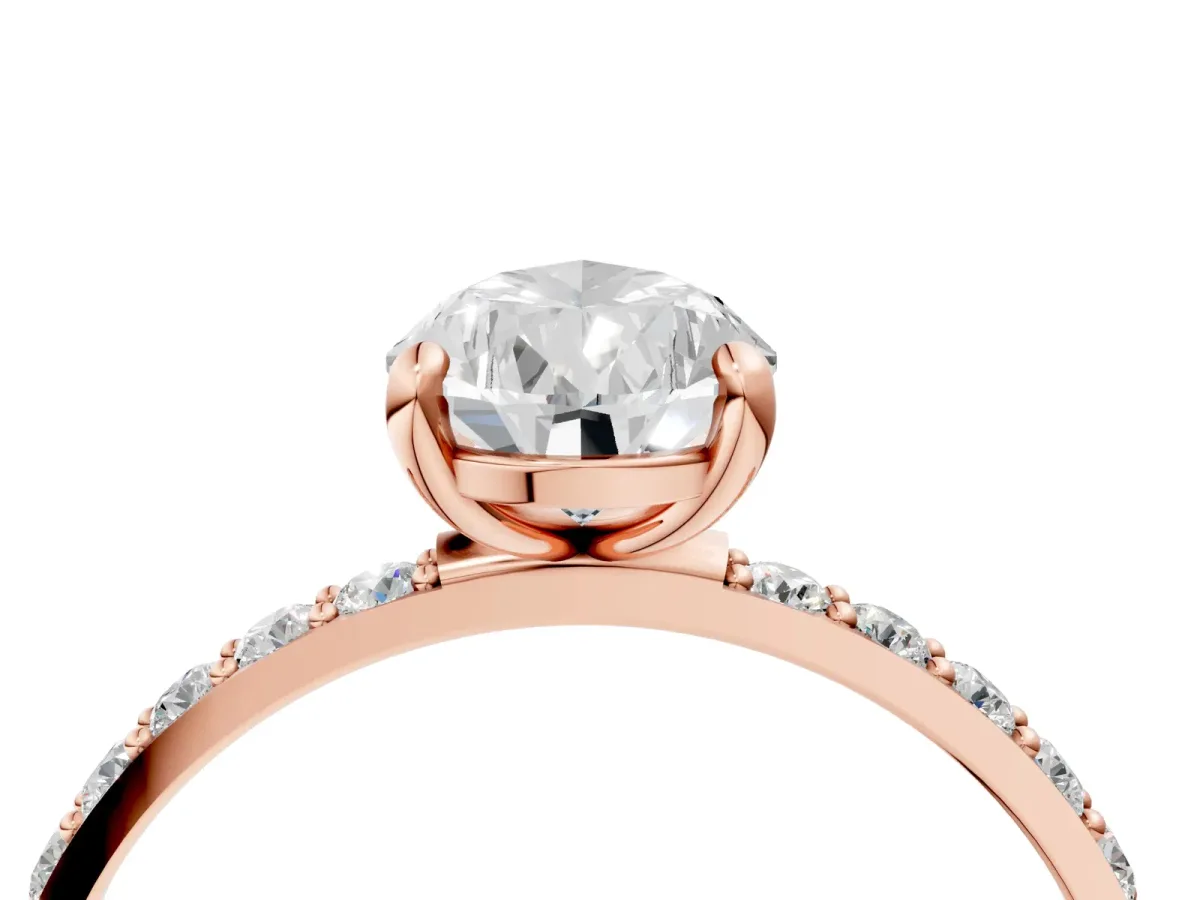 Pear Cut Diamond Solitaire Ring with Round Pavé Band and Prong Setting Rose gold