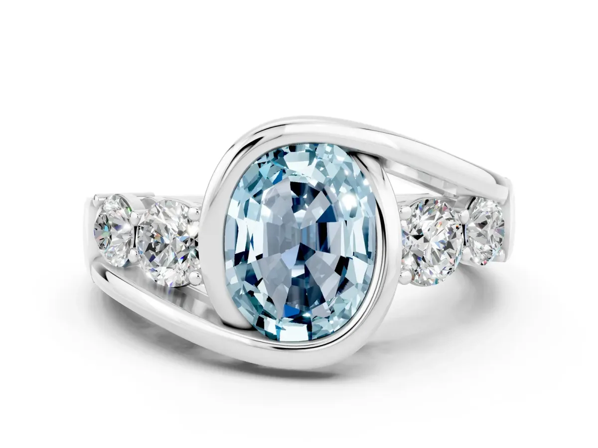 Bezel Set Oval Cut Aquamarine Bypass Ring with Round Accents Silver
