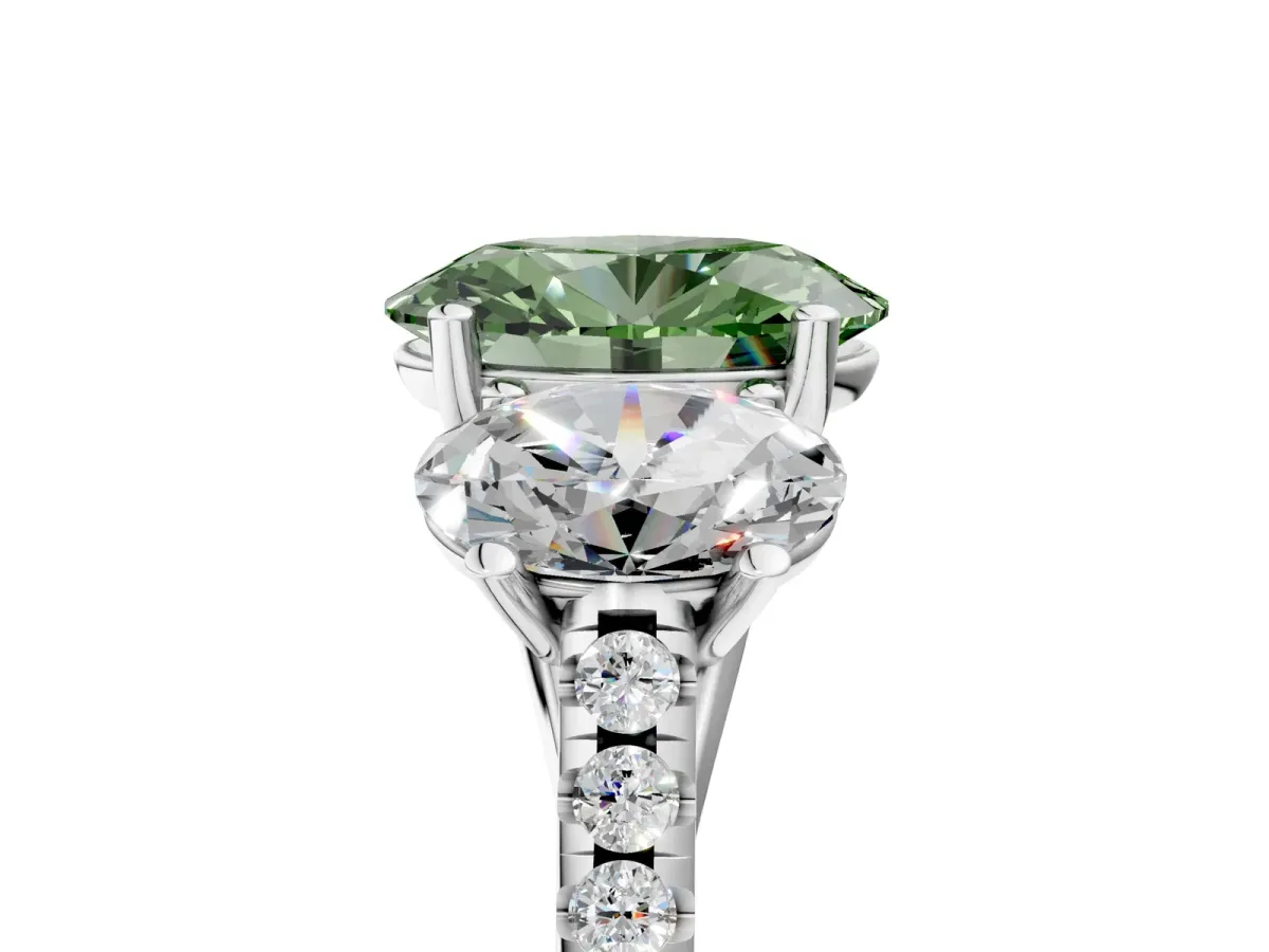 Fancy Green Three-Stone Oval Cut Diamond Ring with Round Pavé Band and Prong Setting Silver