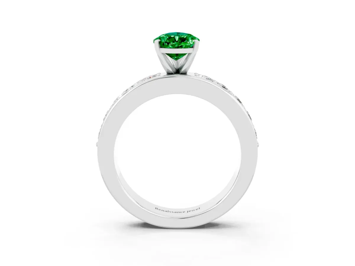 Pear Cut Emerald Engagement Ring with Channel Set Round Band and Prong Setting White gold
