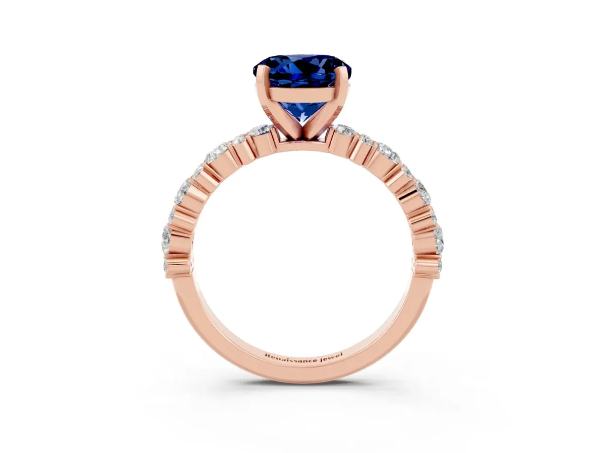Round Cut Blue Sapphire Side Stone Solitaire Ring with Round and Four-Prong Setting Rose gold