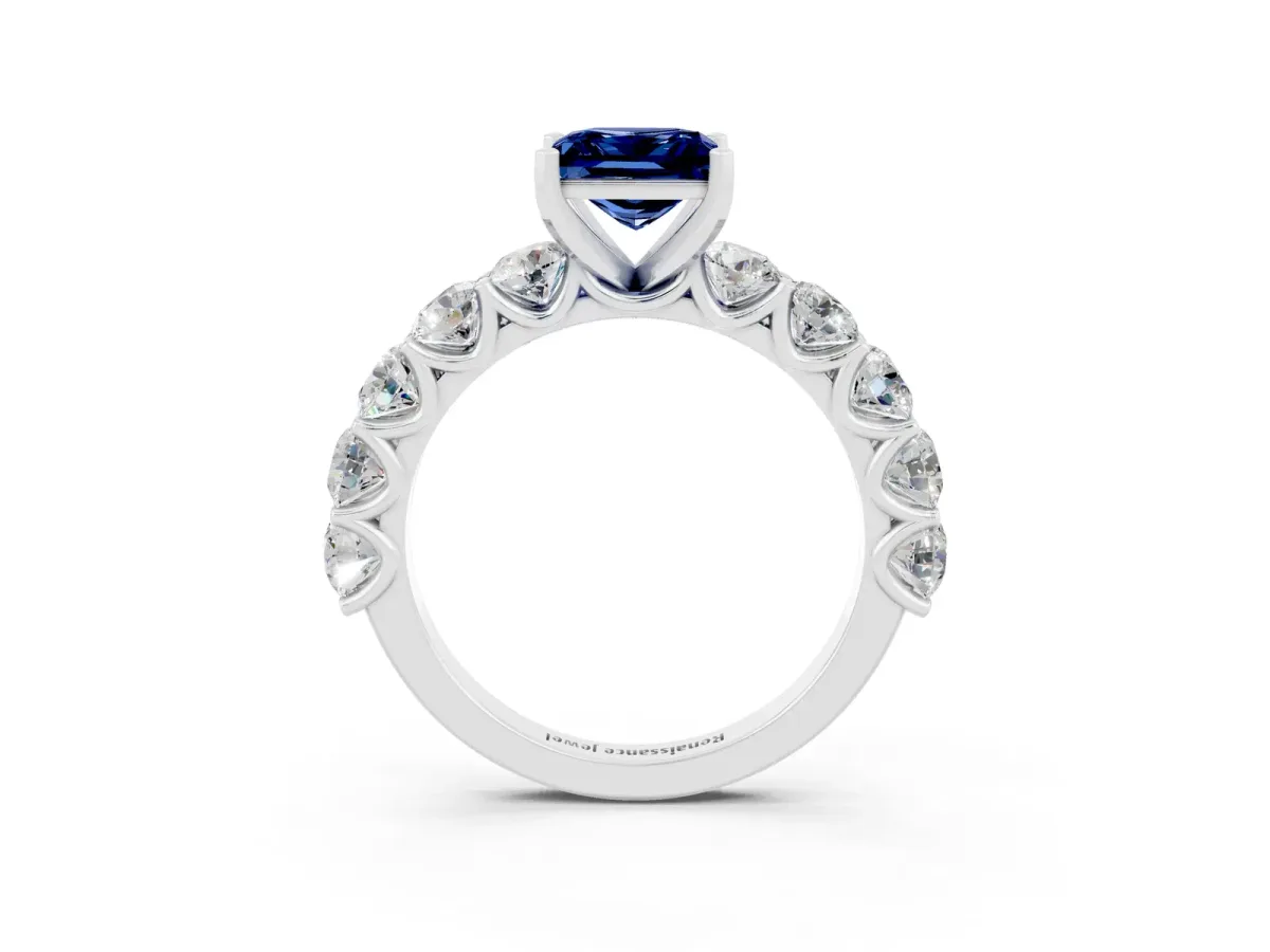 Princess Cut Blue Sapphire Prong Setting with Side Stones on a Pave Band Silver