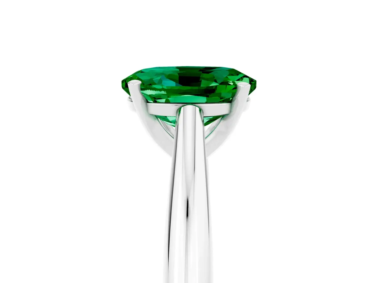 Oval Cut Emerald Solitaire Engagement Ring with Cathedral Setting and Four-Prong Mount White gold