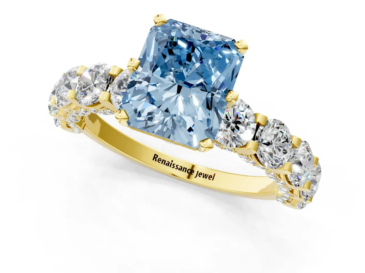 Fancy Blue Radiant Cut Diamond Side Stone Engagement Ring with Four-Prong Setting Yellow gold