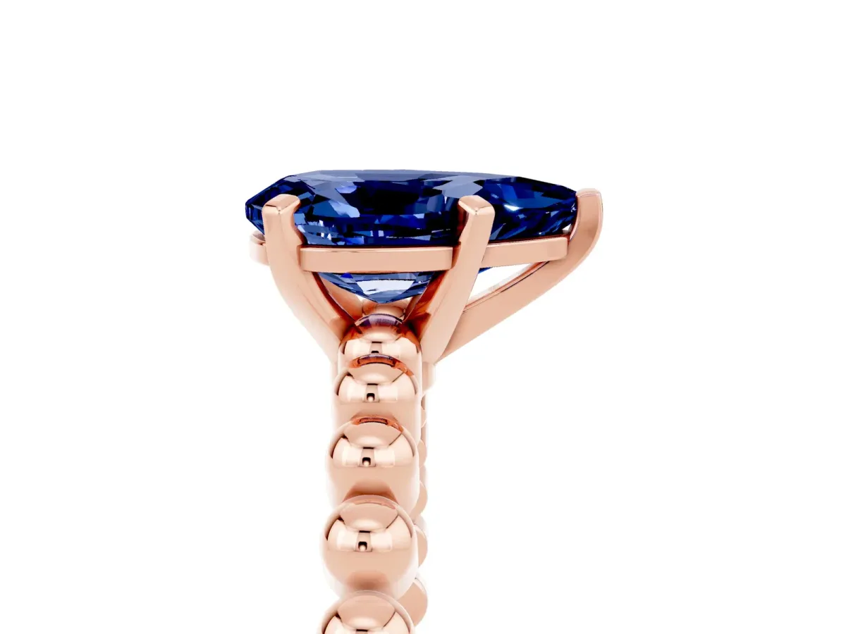 Pear Cut Blue Sapphire Solitaire Ring with Beaded Band and Prong Setting Rose gold