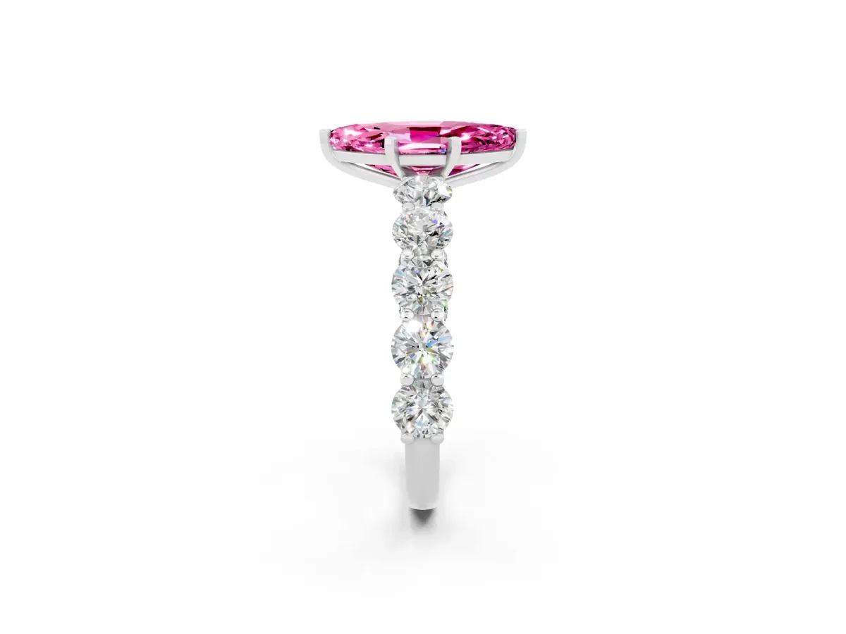 Marquise Cut Pink Sapphire Prong Setting with Side Stones on a Pave Band Silver