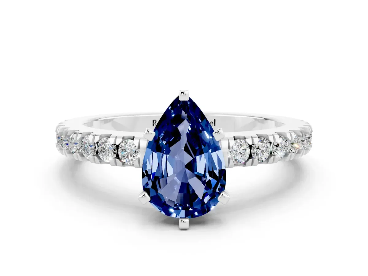 Pear Cut Solitaire Blue Sapphire with Pavé Band and Four-Prong Setting Platinum