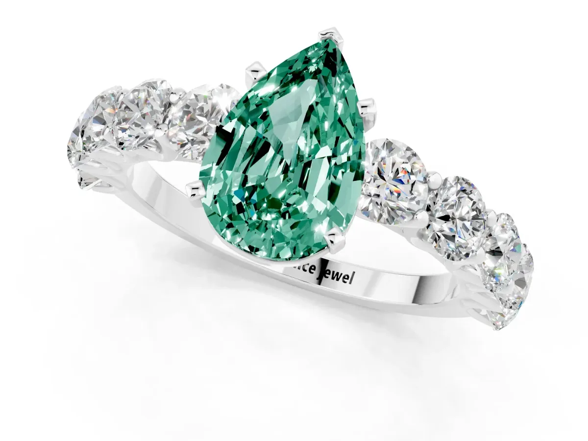 Pear Cut Green Sapphire Prong Setting with Side Stones on a Pave Band Silver