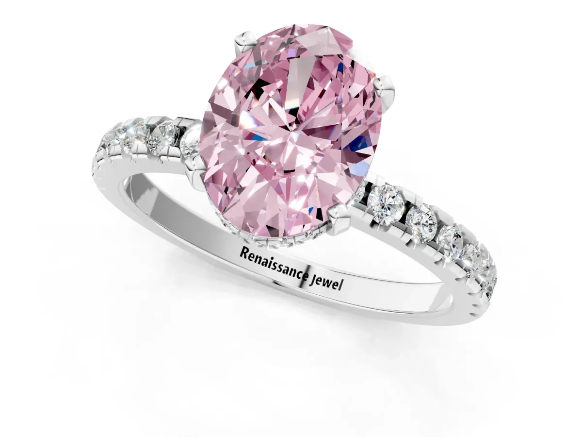 Fancy Pink Oval Cut Diamond Solitaire Ring with Round Pavé Band and Four-Prong Setting Silver