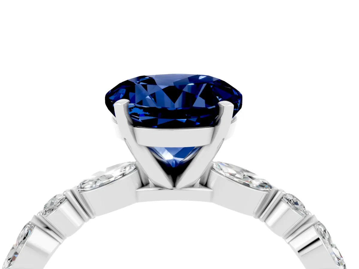 Round Cut Blue Sapphire Ring with Marquise and Round Side Stones and Four-Prong Setting Silver