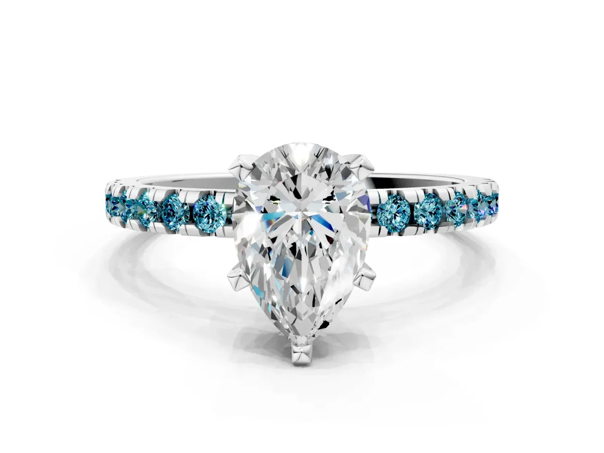 Pear Cut Diamond Solitaire Ring with Round Blue Topaz Pavé Band and Four-Prong Setting Silver