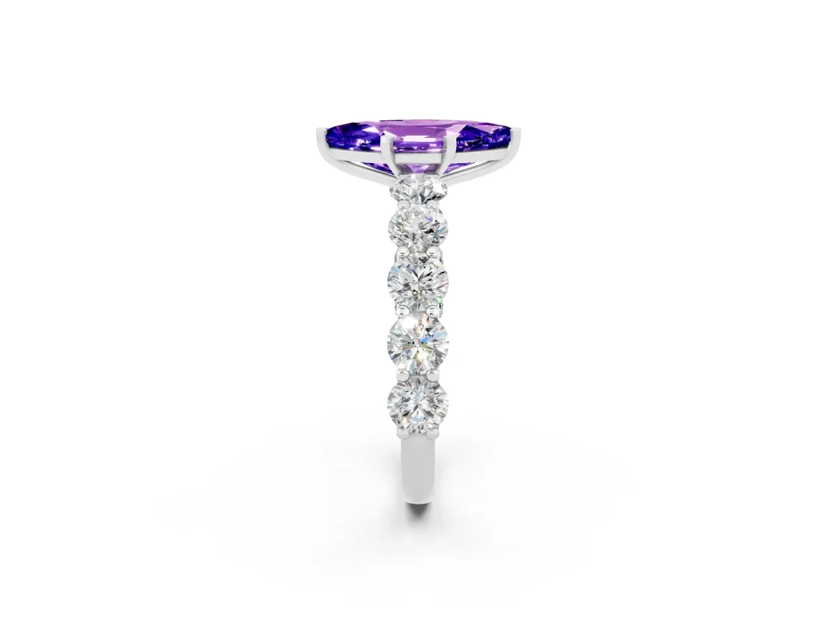 Marquise Cut Tanzanite Prong Setting with Side Stones on a Pave Band Silver