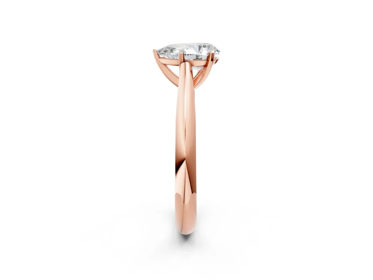 Pear Cut Diamond Solitaire Engagement Ring with Cathedral Setting and Four-Prong Mount Rose gold
