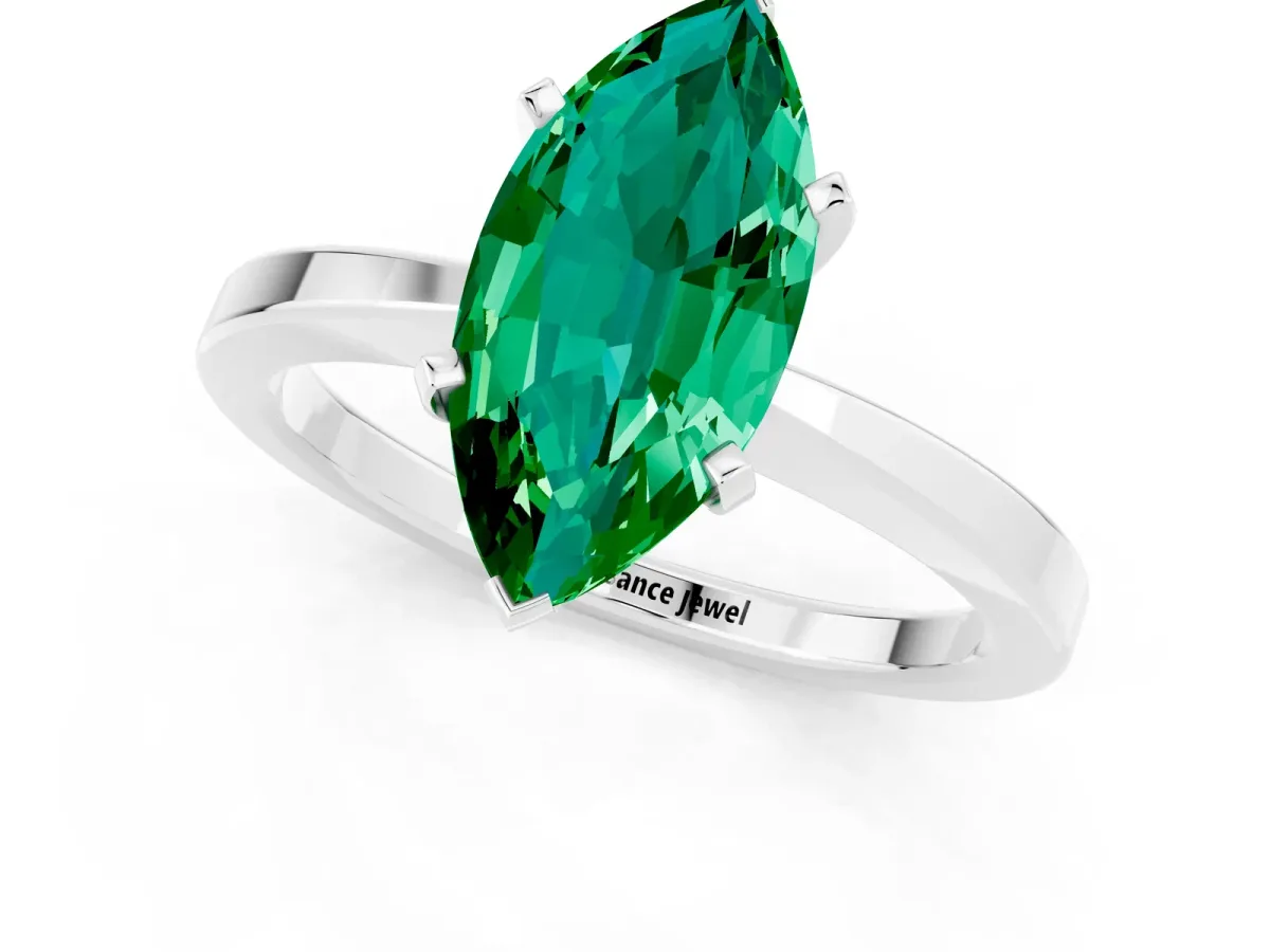 Marquise Cut Emerald Solitaire Engagement Ring with Classic Band and Four-Prong Setting Silver