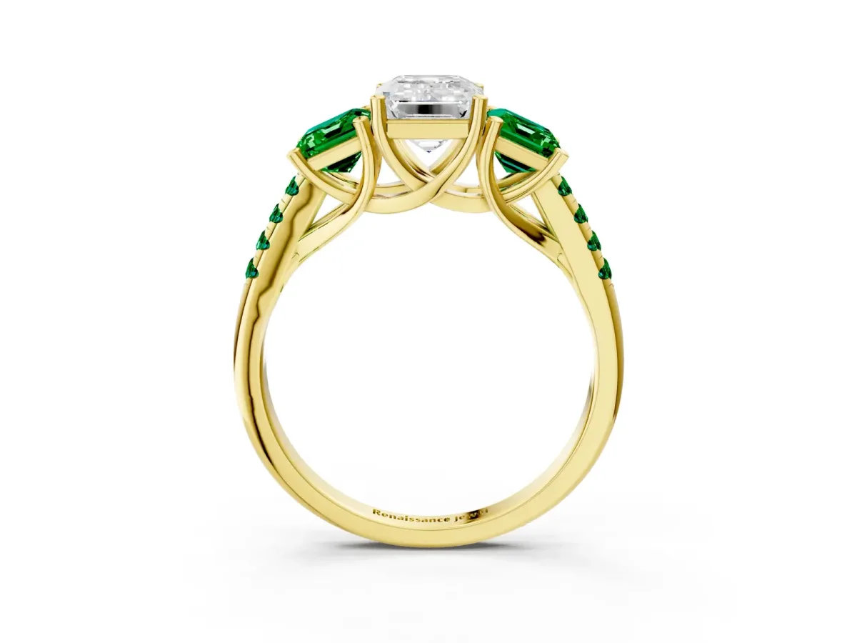 Three-Stone Emerald Cut Diamond Ring with Round Emerald Pavé Band and Prong Setting Yellow gold