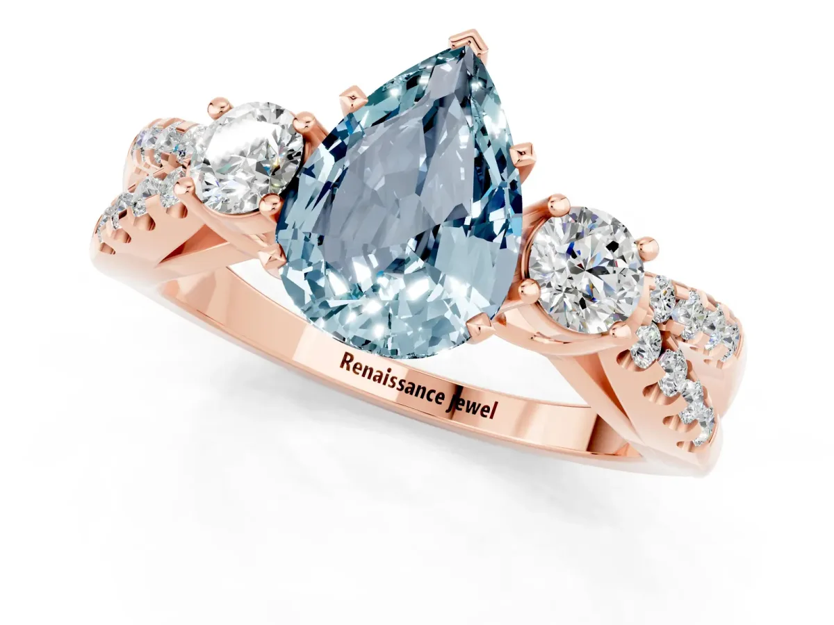 Pear Cut Aquamarine Three-Stone Ring with Pavé Split Shank and Four-Prong Setting Rose gold