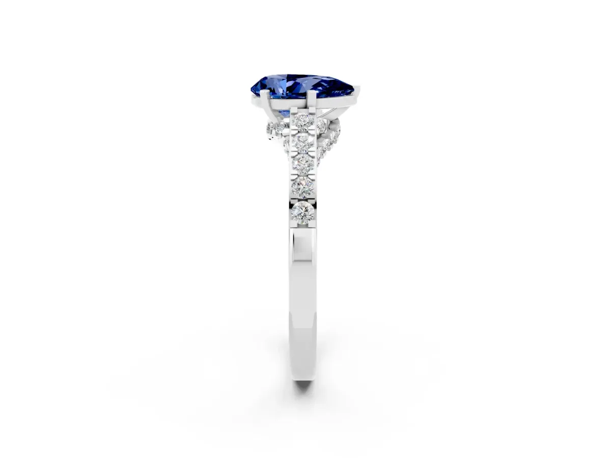 Pear Cut Blue Sapphire Solitaire Ring with Crossover Gallery and Round Pavé Band Silver