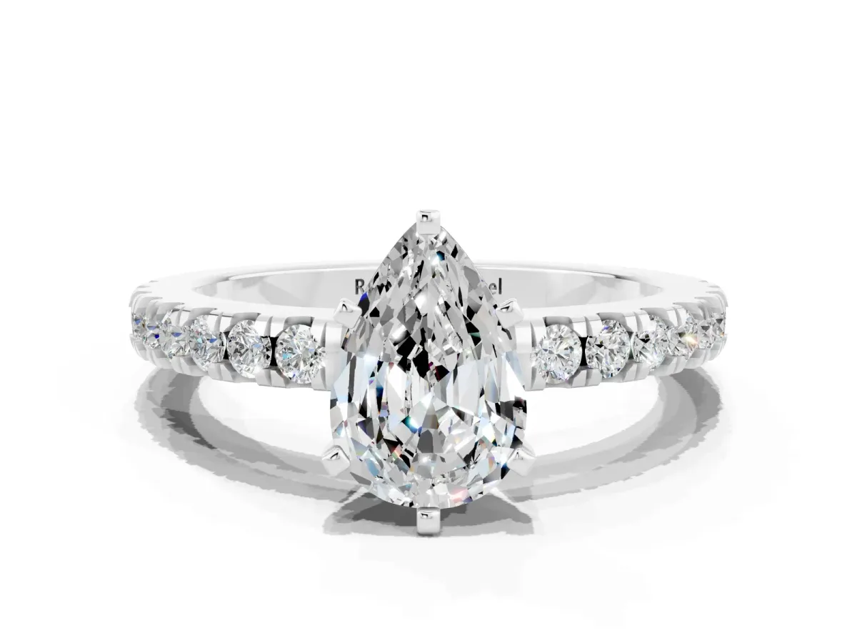 Pear Cut Solitaire Moissanite with Pavé Band and Four-Prong Setting Silver
