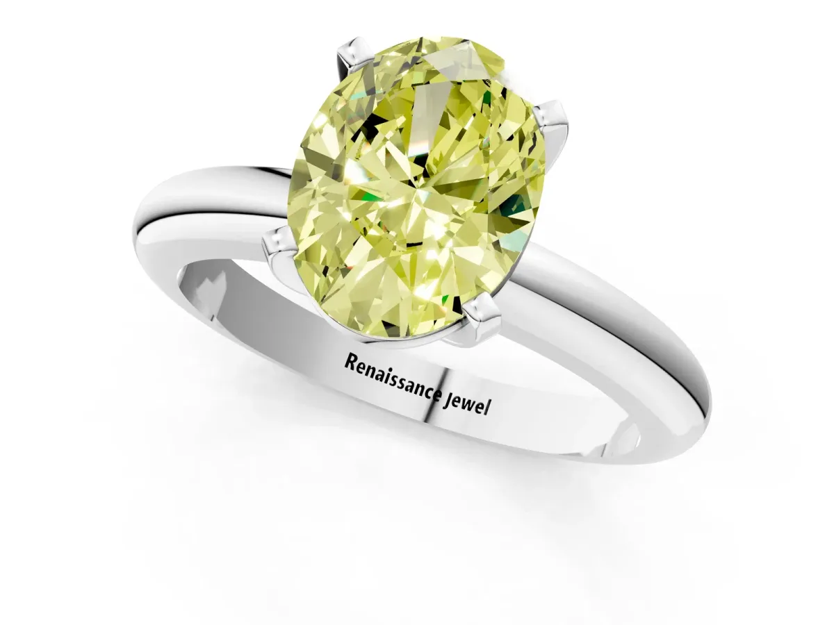 Fancy Yellow Oval Cut Diamond Solitaire Engagement Ring with Round Band and Four-Prong Setting Silver