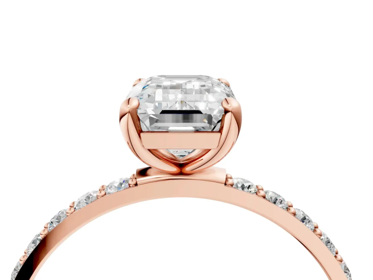 Emerald Cut Diamond Solitaire Ring with Round Pavé Band and Prong Setting Rose gold