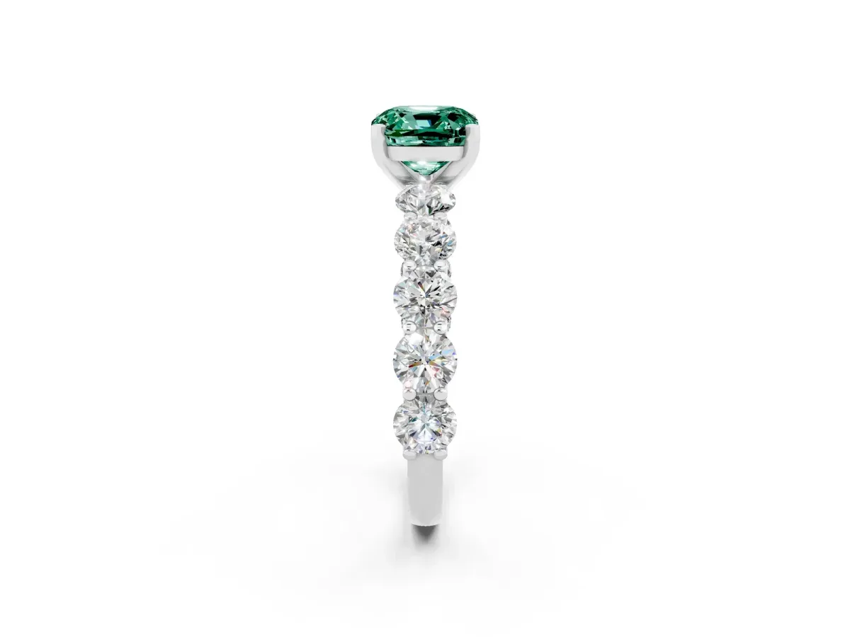 Cushion Cut Green Sapphire Prong Setting with Side Stones on a Pave Band Silver